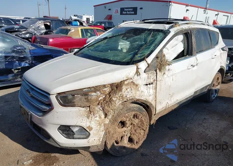 2018 Ford Escape Titanium z USA, uszkodzony, nr VIN 1FMCU0J95JUA71473